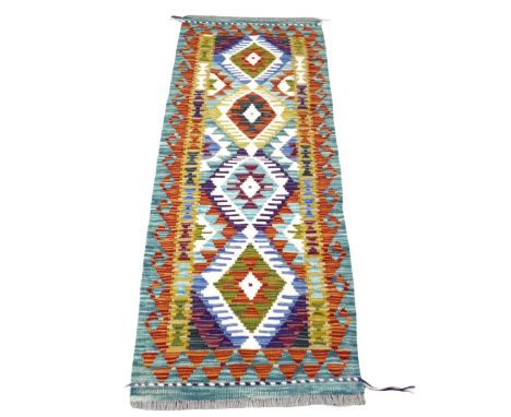 A Chobi Kilim runner hand knotted woolen rug, 143 by 55cm.