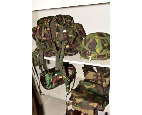 A GROUP OF MILITARY/CAMOFLAGE CLOTHING AND ACCESSORIES, to include ruck sack, sleeping bag, torch, trousers (size large/regul