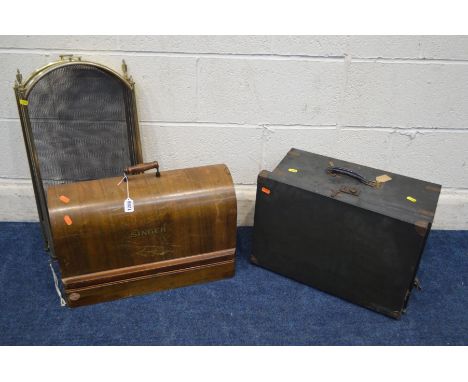 A WALNUT CASED SINGER SEWING MACHINE, and another Singer sewing machine, together with a brass folding firescreen (3)