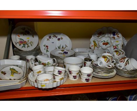 A QUANTITY OF ROYAL WORCESTER 'EVESHAM' PATTERN DINNER AND COOKWARE, including eleven dinner plates, eight cups and saucers, 