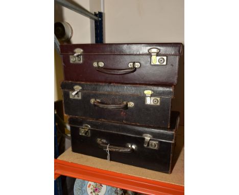 THREE VINTAGE LEATHER COVERED MEDICAL CASES WITH DRAWERS FITTED TO THE INTERIORS, the lid interiors with expanding pocket, tw