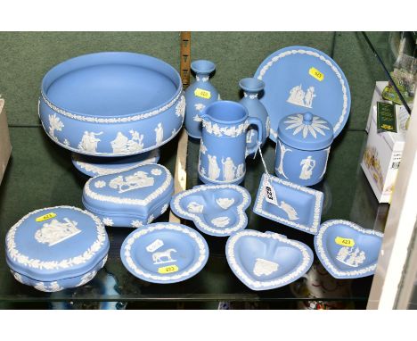 THIRTEEN PIECES OF PALE BLUE WEDGWOOD JASPERWARE, including a pedestal fruit bowl, a pair of vases, five trinket dishes, two 