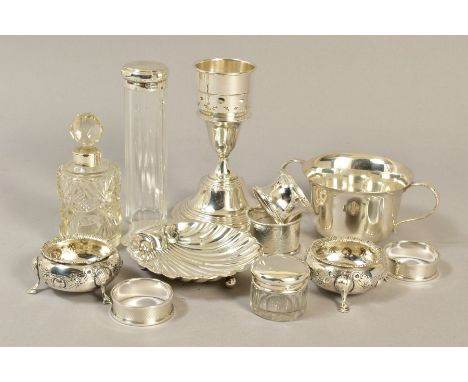 A GROUP OF SILVER, comprising an Elizabeth II candle holder, lacking a glass shade, loaded base, Birmingham 1977, together wi