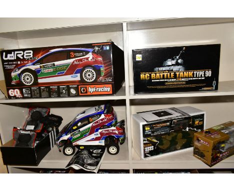 THREE BOXED REMOTE CONTROL VEHICLES, comprising an hpi: racing WR8 Flux Ford Fiesta RS WRC, with some spares, a 1:54 scale Ti