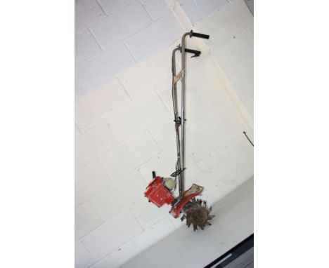 A MANTIS PETROL GARDEN ROTIVATOR with four 8'' blade (engine pulls freely but no fuel so doesn't start)