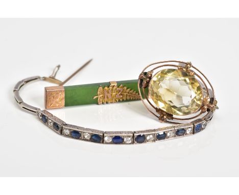 A SELECTION OF ITEMS, to include a yellow metal brooch set with a large oval cut citrine, within an openwork leaf detail surr