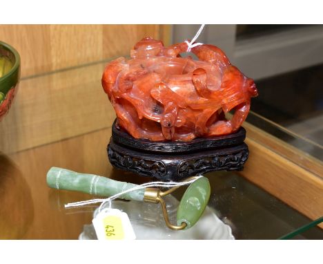 A HARDSTONE BRUSH WASH, on wooden stand, approximate height 9cm and a jade/green hardstone roller (2) (CAN NOT TAKE IMAGE OF 