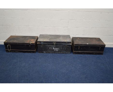 A PAIR OF VINTAGE BLACK PAINTED TIN TRUNKS, width 83cm x depth 47cm x height 32cm, together with another similar trunk (3)