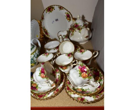 A ROYAL ALBERT OLD COUNTRY ROSES TEASET, six settings, seconds quality bread and butter plate, milk jug, all six cups and sau