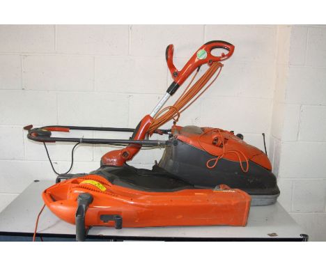 A FLYMO VISION COMPACT 330 LAWN MOWER, a Flymo power trim 500 XT strimmer and a Flymo garden vac 2700W turbo (all PAT pass an