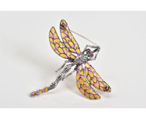 A PLIQUE A JOUR BROOCH, in the form of a dragon fly, with pink and yellow enamel wings and circular ruby eyes, stamped 925, l