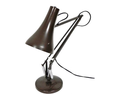 An Anglepoise desk lamp, in brown.