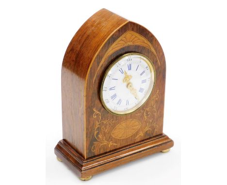 A late 19thC rosewood and inlaid lancet mantel clock, with a white enamel dial marked Russells Ltd of Paris, bearing Roman an