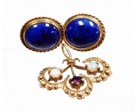 A pair of 9ct gold and lapis lazuli earrings, oval cabochons in a rope twist setting, together with a 9ct gold amethyst and o