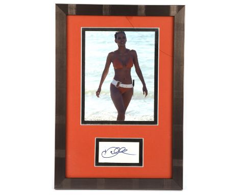 Halle Berry as Jinx in Die Another Day (2002) Autograph -An autograph display, composed of a full colour 10"x8" and a signed 