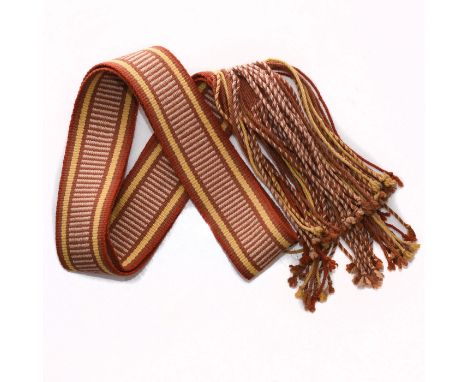 Hand woven with Native geometric tribal designs throughout.A Native American Navajo Hopi Indian handmade woven belt sash, dec