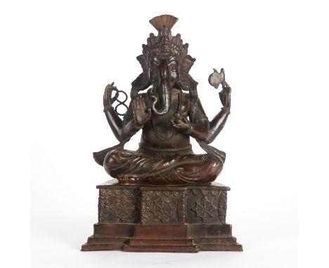 Four armed Ganesha holding axe, sweets, and rosary.From the James and Marilyn Alsdorf Collection. Total weight 22.5 lbs. Issu
