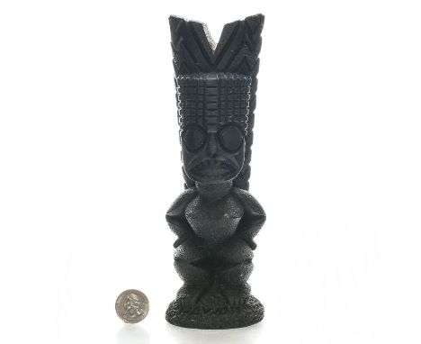 Carved model of Kanaloa, the god of the Underworld and magic.Tiki statues represent the many Tiki gods in Hawaiian and Polyne