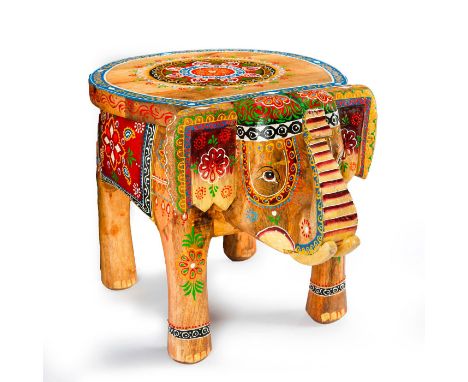 Traditional Rajasthani style hand painted polychrome wood stool.Decorative piece crafted in the shape of an elephant with a t