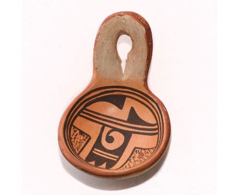 Hand decorated with naturalistic pigments and Native designs.A Native American hanging water scoop ladle made in clay with na
