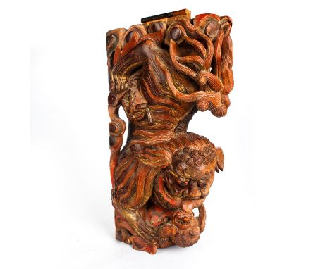 Northern Chinese, delicately carved wood, Foo dog playing with pup.Includes custom made bracket. Issued: c. 1880 Dimensions: 