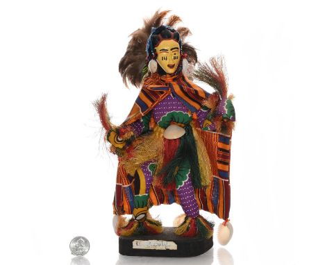 Vibrant cloak and mask. Decorated with feathers and shells. Issued: 1950 c. Dimensions: 12""H Provenance: David Farin Collect