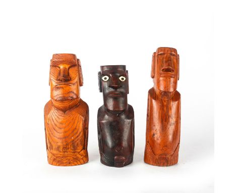 Wooden statues replicating the monolithic statues on Easter Island.Hand carved wood replicas, possibly teak. Easter Islands' 