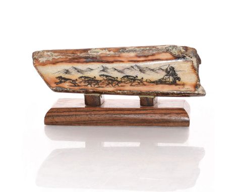 Exemplary incised decoration with mountains, sled, dogs &amp; driver.An exquisite Native Alaskan Inuit tribal carving on antl