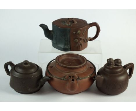 A Chinese Yixing two-tone teapot, 20th century, of stylised tree trunk form, with branch detailing to the handle and bamboo d