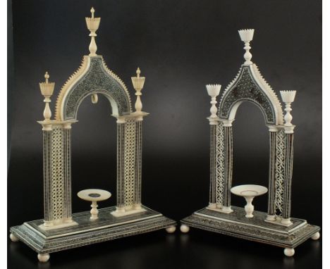 Two Anglo-Indian ivory and sadeli-work watch stands, both second half 19th century, each of architectural design, with pierce