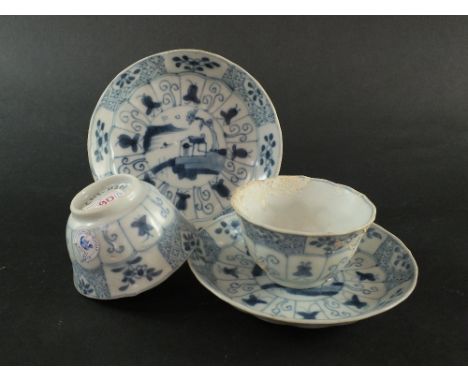 Ca Mau: Two blue and white 'Landscape, Panel and Trellis' pattern saucers, circa 1725, each centrally decorated with an islan