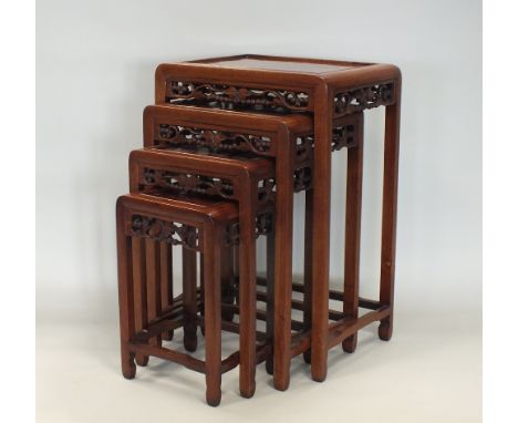 A nest of Chinese rosewood quartetto occasional tables, first half 20th century, each of rectangular form with a single reces