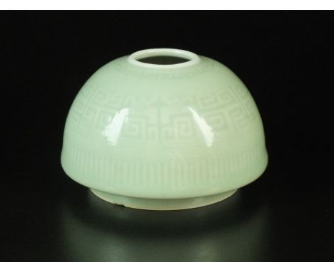 A Chinese celadon glaze water coupe, Qing Dynasty, of dome form on a slightly raised foot, with all over glaze, incised with 