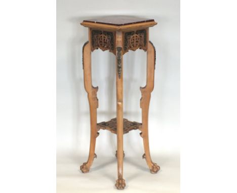 A Japanese jardiniere stand, 20th century, with inlaid rouge marble top, pierced and embossed brass mounts embellishing a sho