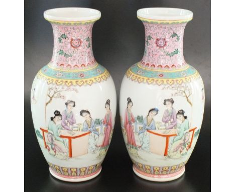 A pair of Chinese famille rose vases, Republic Period (1912-1949), each of baluster form, painted with mirrored designs depic