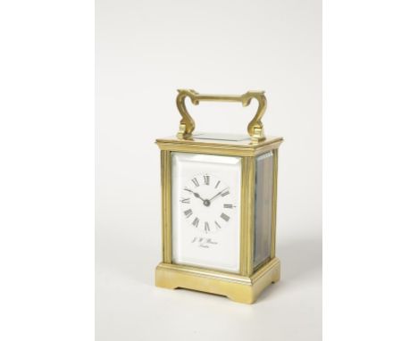 J W BENSON: A FRENCH BRASS CASED CARRIAGE CLOCK, the white enamelled dial with Roman numerals, inscribed "J.W Benson London",