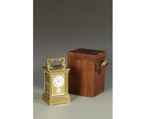 A. H RODANET: A French gilt brass quarter repeating alarm carriage clock, the round white enamelled dial with Roman numerals 