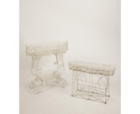 A VICTORIAN WIREWORK PLANTER with a cartouche-shaped trough on scrolling base, 34" high x 35" wide, and another of similar 23