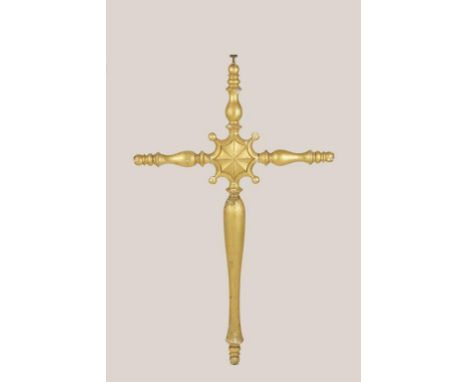 A LARGE ARCHITECTURAL CARVED AND GILT HANGING CROSS with a central starburst motif, 64" high x 40.5" wide. Provenance: The Pe