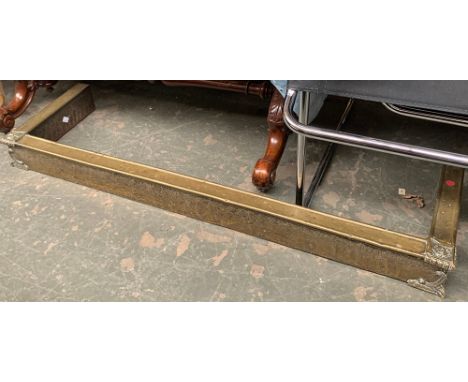 A brass clad fire grate, 118cmW 
