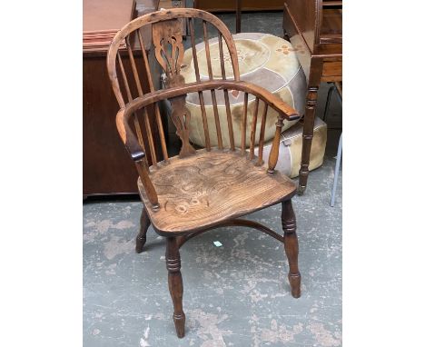 A 19th century splatback Windsor chair, burr yew and elm, on ring turned legs, joined by crinoline stretcher 