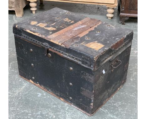 A Victorian studded and metal bracketed storage trunk, 69cmW 