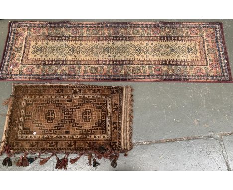 A West Persian saddle bag rug, 112x65cm, together with a modern wool runner rug, 226x69cm 