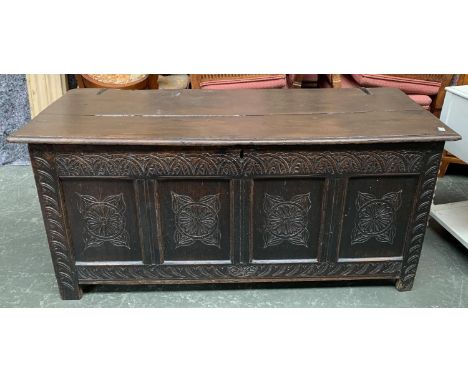 An 18th century four panel oak coffer, with demilune frieze, 130x150x160cm 