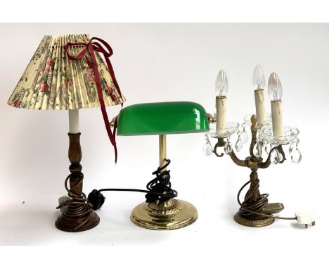 A banker's lamp with green glass shade, together with a three arm light with glass drops and one other 