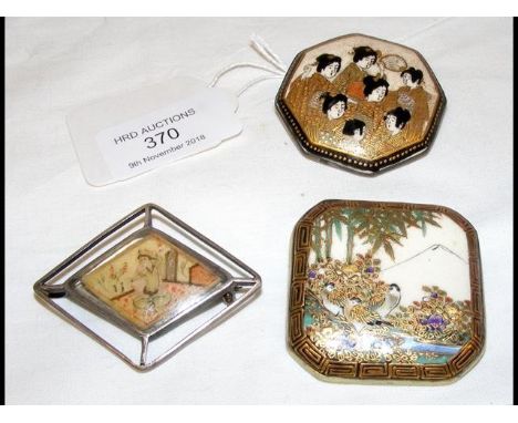 Two Satsuma ceramic brooches, together with one other 