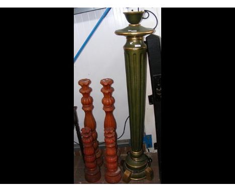 Wooden tapered standard lamp, together with carved wooden candlesticks 