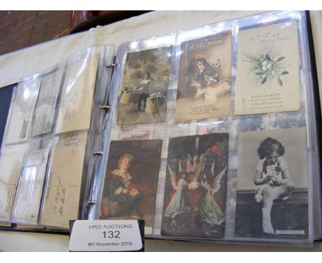 Album containing approx. 200 vintage greetings and romantic postcards 