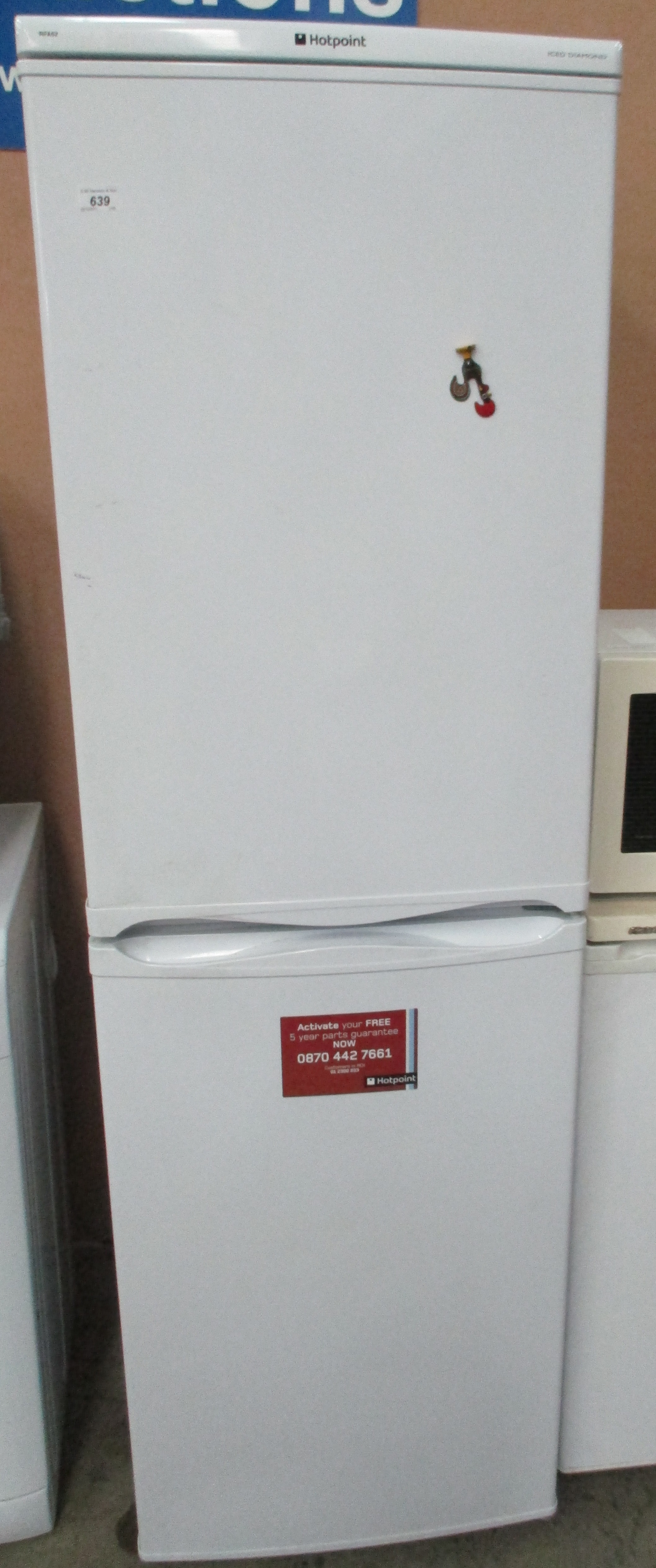 ... A Hotpoint Iced Diamond RFA52 upright fridge freezer