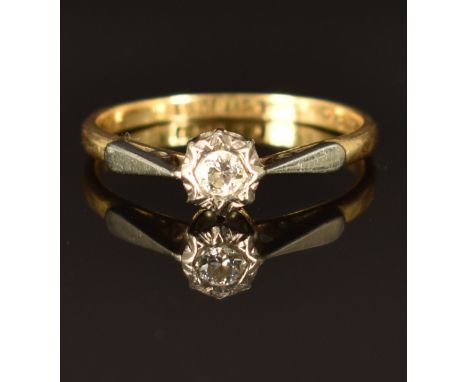 An 18ct gold ring set with a diamond in a platinum setting,&nbsp;size L/M, 2g&nbsp;